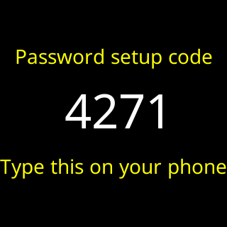 The ticker’s own screen showing a four-digit password setup code, with the instruction to type it on your phone